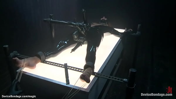 Black in spandex trussed and stimulated