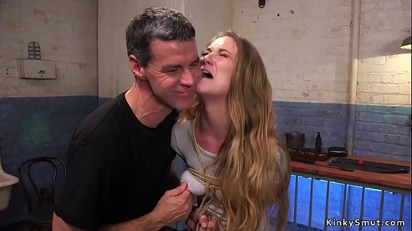 Lengthy haired dark haired fucked in restrain bondage