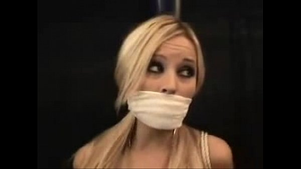 Platinum-blonde in restrain bondage