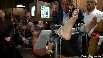 Red-haired marionette Cassandra Nix is fettered and toyed then made to fuck blonde with fake penis gag in public bondage & discipline place by mistress Princess Donna Dolore