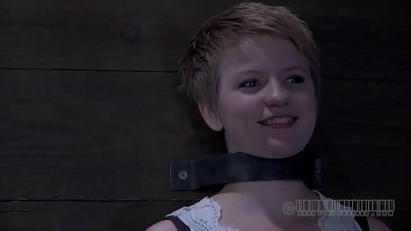 Tied up beauty waits lustily